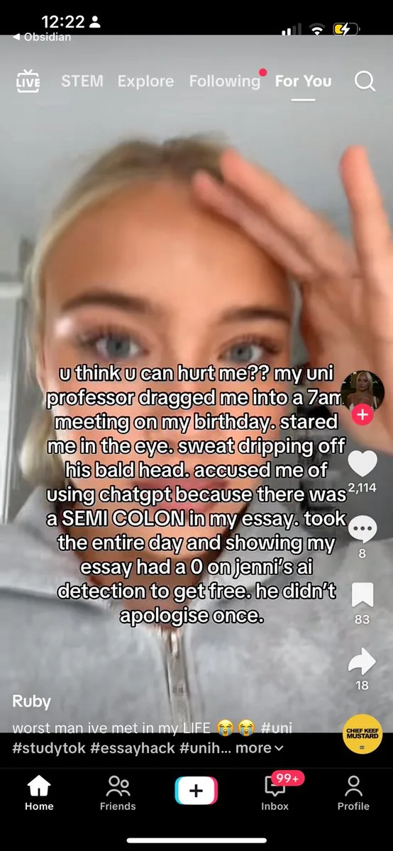 dan's screenshot of the real creator version on the tiktok for you page: a face-to-camera studytok story about a professor accusing her of using chatgpt. 2,114 likes, 8 comments, 83 saves, 18 shares.