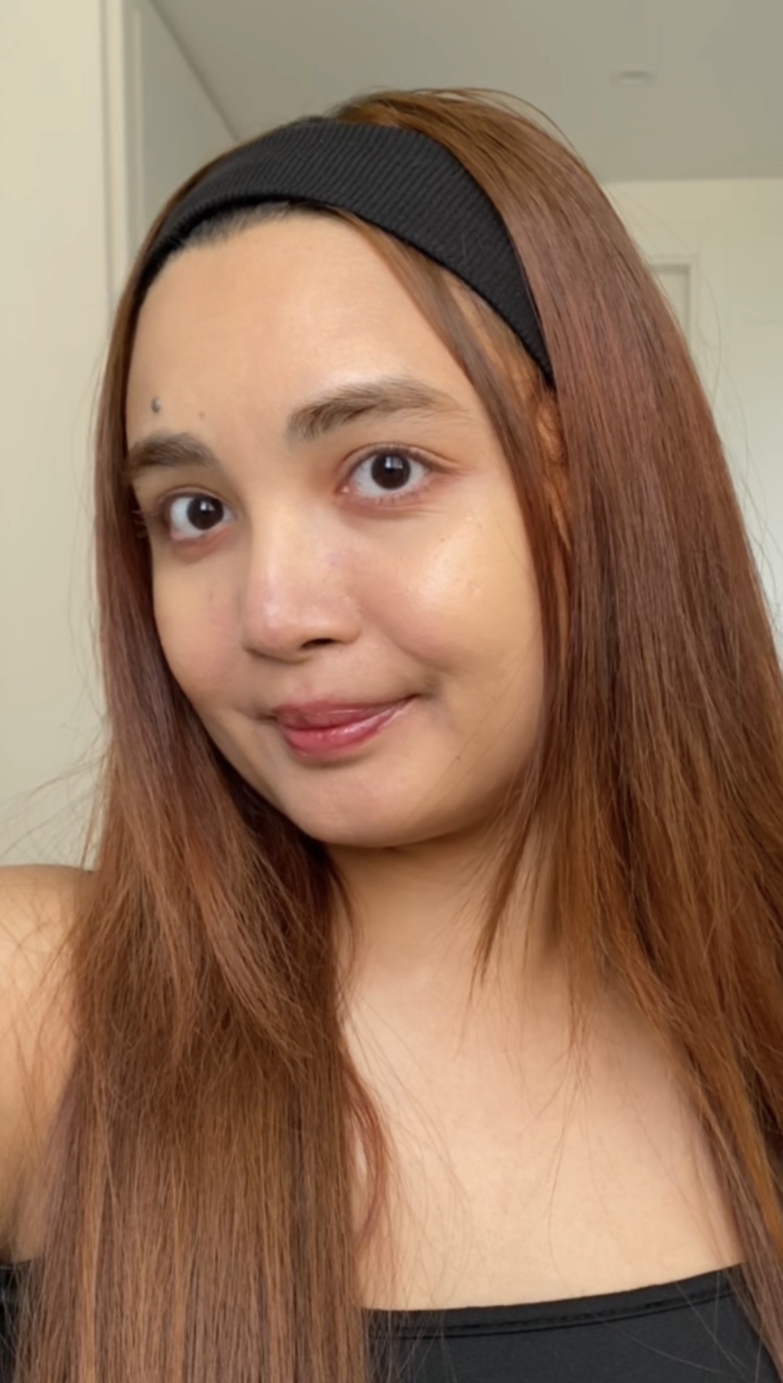 Smiling Woman in Black Headband