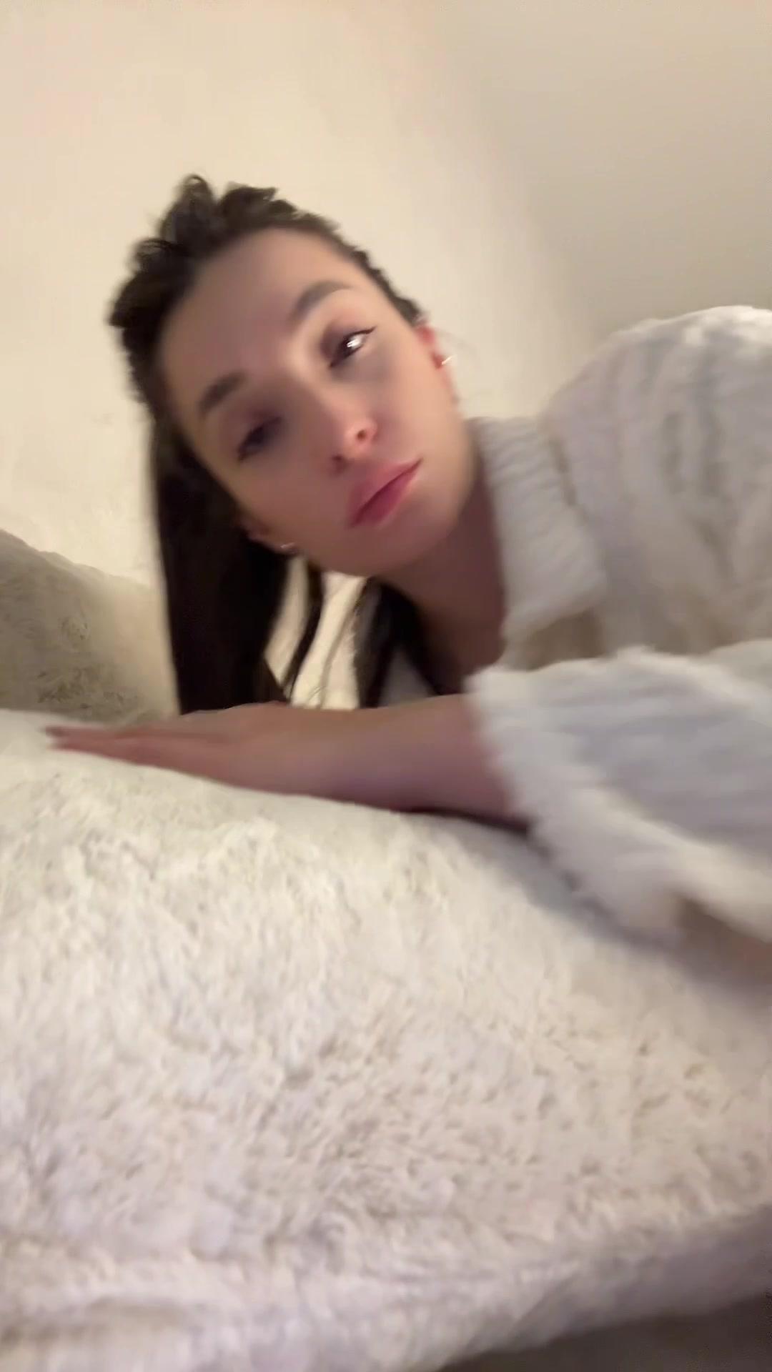 Woman Lying Down to Sleep in Bed