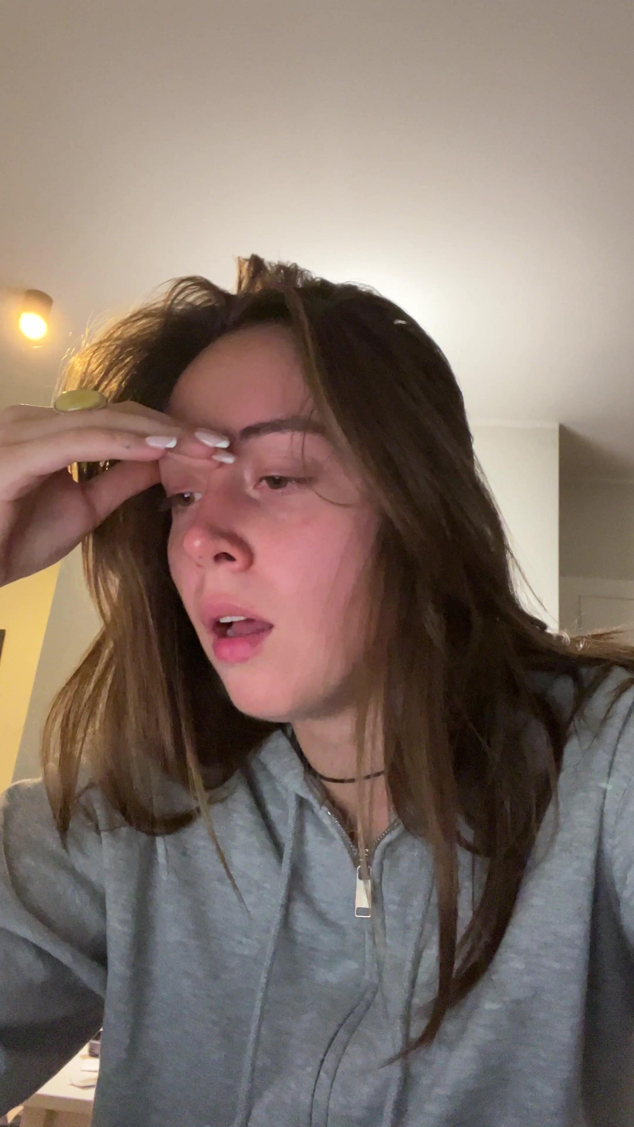 Tired Young Woman Yawning Indoors