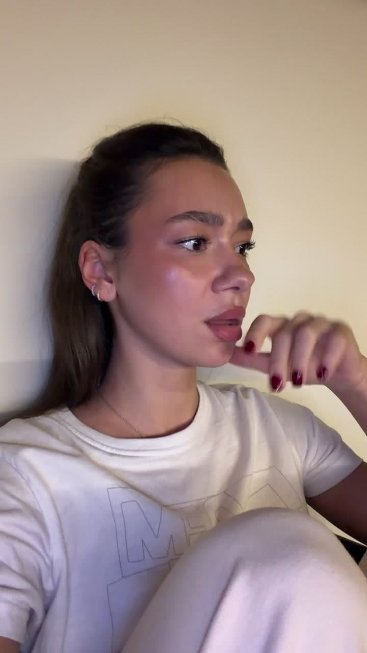 Woman Reacting With Sudden Shock and Disbelief
