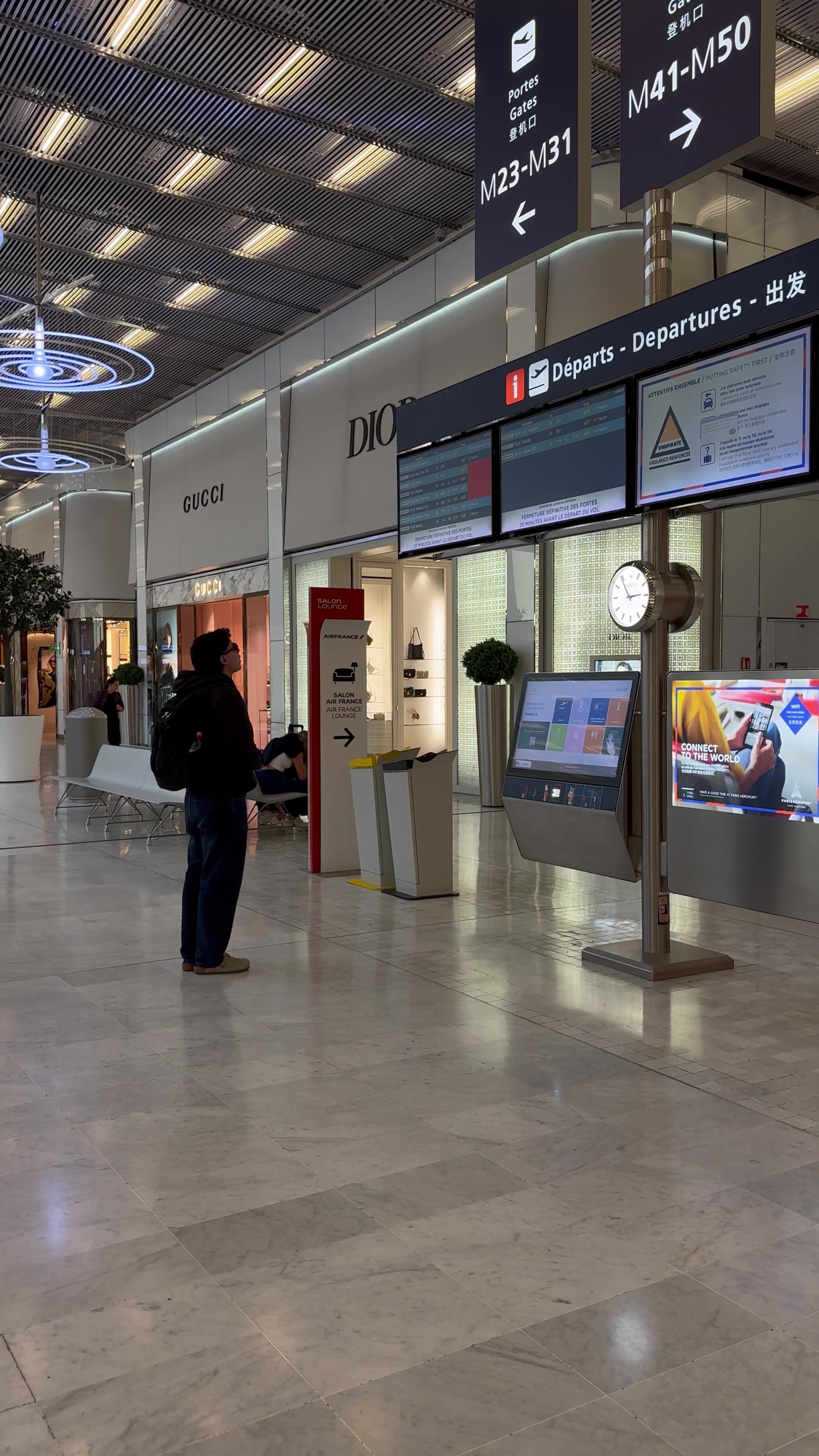 Traveler Walking Through Airport Terminal
