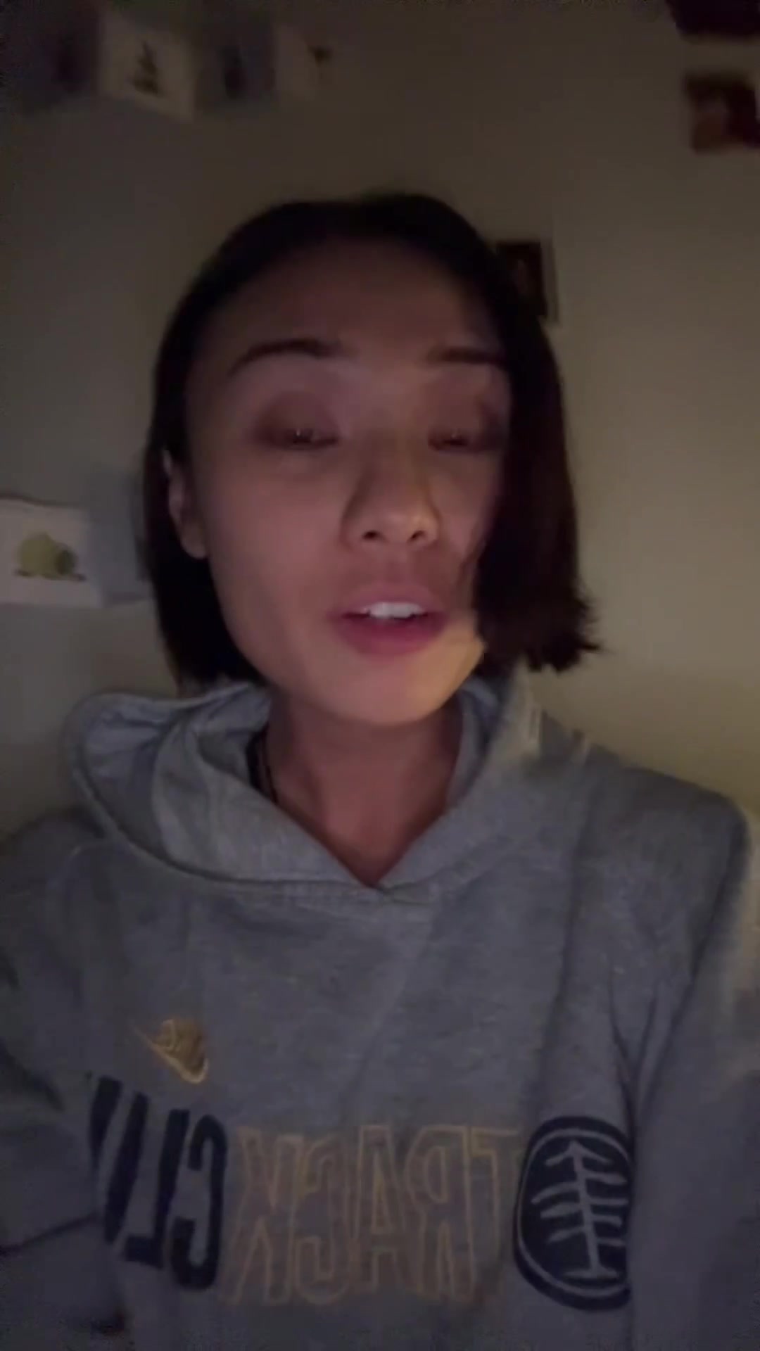 Woman Whispering A Secret To Camera