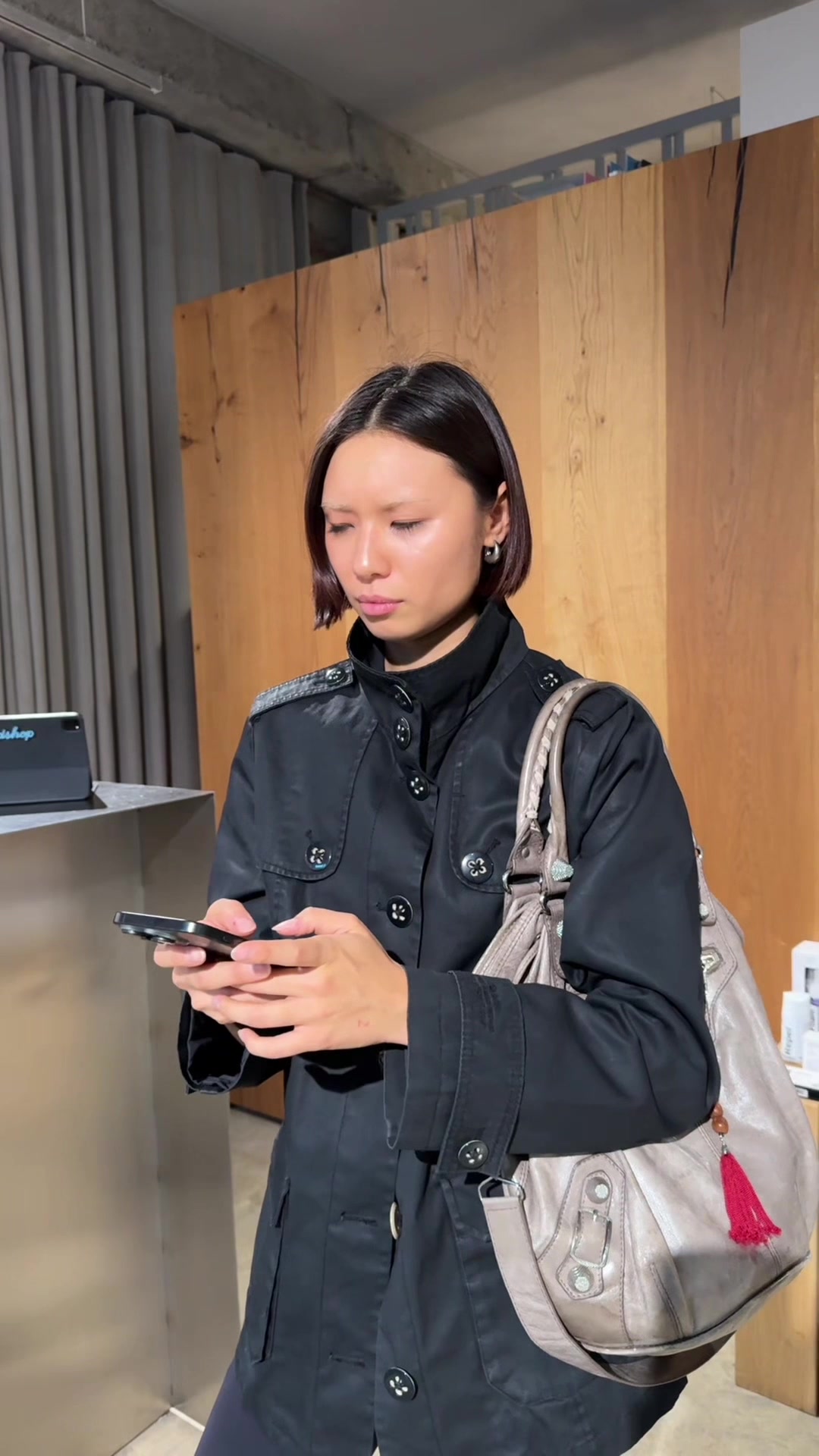 Woman Looking Confused at Phone